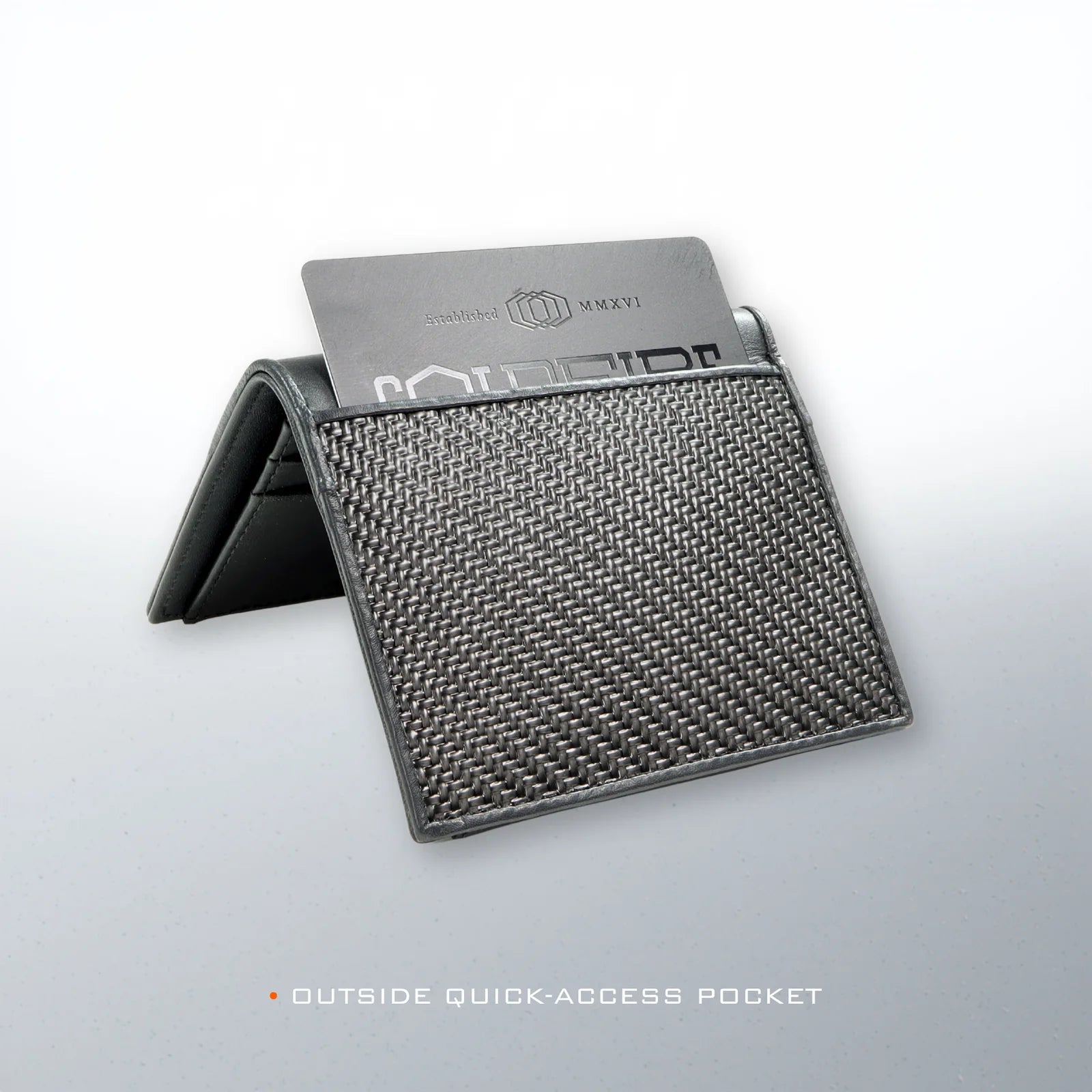 COLDFIRE Flex wallet outside quick-access pocket holding a COLDFIRE metal card, woven flexible carbon front panel